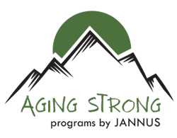 green colored sun rising over outlined mountains with the words Aging Strong programs by Jannus under
