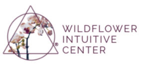 "Wildflower intuitive center" with logo of a circle with a triangle overlayed and cherry blossoms growing through it